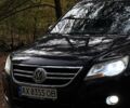 Черный Фольксваген Тигуан, объемом двигателя 2 л и пробегом 274 тыс. км за 10000 $, фото 1 на Automoto.ua