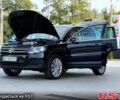 Черный Фольксваген Тигуан, объемом двигателя 2 л и пробегом 283 тыс. км за 9500 $, фото 1 на Automoto.ua