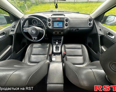 Чорний Фольксваген Тігуан, об'ємом двигуна 2 л та пробігом 309 тис. км за 8700 $, фото 7 на Automoto.ua