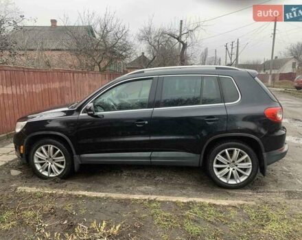 Чорний Фольксваген Тігуан, об'ємом двигуна 2 л та пробігом 199 тис. км за 10700 $, фото 5 на Automoto.ua
