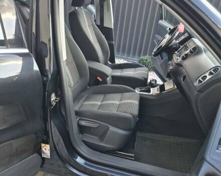 Чорний Фольксваген Тігуан, об'ємом двигуна 2 л та пробігом 218 тис. км за 9300 $, фото 1 на Automoto.ua