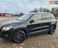 Черный Фольксваген Тигуан, объемом двигателя 2 л и пробегом 252 тыс. км за 14700 $, фото 1 на Automoto.ua