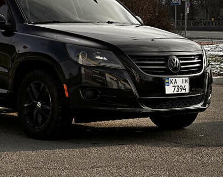 Черный Фольксваген Тигуан, объемом двигателя 2 л и пробегом 225 тыс. км за 9400 $, фото 1 на Automoto.ua