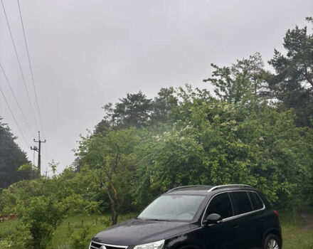 Черный Фольксваген Тигуан, объемом двигателя 1.39 л и пробегом 204 тыс. км за 9700 $, фото 2 на Automoto.ua