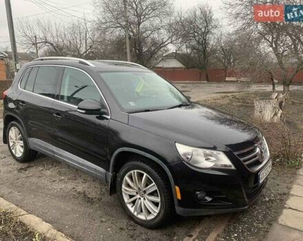 Чорний Фольксваген Тігуан, об'ємом двигуна 2 л та пробігом 199 тис. км за 10700 $, фото 7 на Automoto.ua