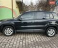Черный Фольксваген Тигуан, объемом двигателя 2 л и пробегом 180 тыс. км за 8200 $, фото 1 на Automoto.ua