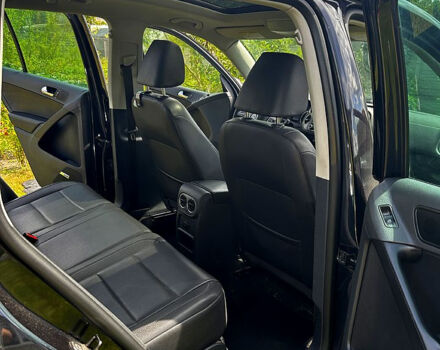 Чорний Фольксваген Тігуан, об'ємом двигуна 2 л та пробігом 309 тис. км за 8700 $, фото 4 на Automoto.ua