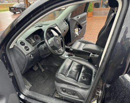 Черный Фольксваген Тигуан, объемом двигателя 2 л и пробегом 285 тыс. км за 13400 $, фото 3 на Automoto.ua