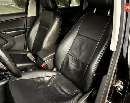 Черный Фольксваген Тигуан, объемом двигателя 2 л и пробегом 225 тыс. км за 9400 $, фото 17 на Automoto.ua