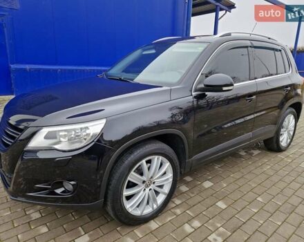 Черный Фольксваген Тигуан, объемом двигателя 2 л и пробегом 195 тыс. км за 13300 $, фото 1 на Automoto.ua