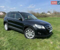 Чорний Фольксваген Тігуан, об'ємом двигуна 2 л та пробігом 260 тис. км за 13000 $, фото 1 на Automoto.ua