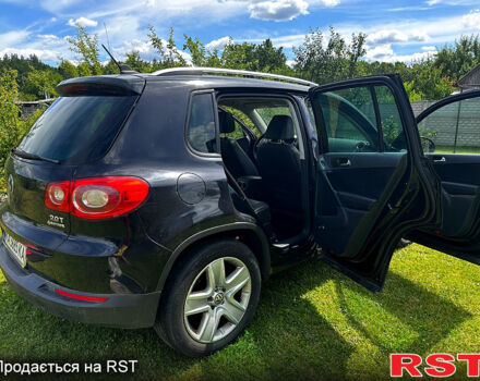 Чорний Фольксваген Тігуан, об'ємом двигуна 2 л та пробігом 309 тис. км за 8700 $, фото 3 на Automoto.ua