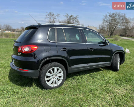 Чорний Фольксваген Тігуан, об'ємом двигуна 2 л та пробігом 260 тис. км за 13000 $, фото 1 на Automoto.ua