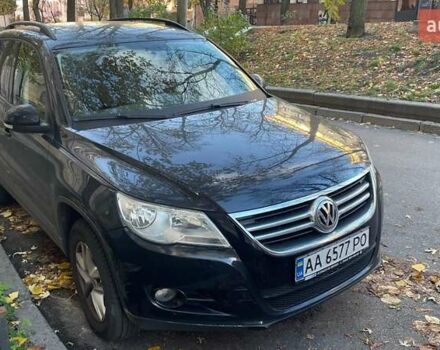 Черный Фольксваген Тигуан, объемом двигателя 2 л и пробегом 223 тыс. км за 10450 $, фото 1 на Automoto.ua