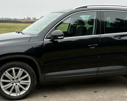 Черный Фольксваген Тигуан, объемом двигателя 1.39 л и пробегом 213 тыс. км за 9399 $, фото 2 на Automoto.ua