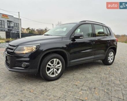 Чорний Фольксваген Тігуан, об'ємом двигуна 1.39 л та пробігом 253 тис. км за 11500 $, фото 1 на Automoto.ua