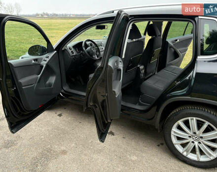 Черный Фольксваген Тигуан, объемом двигателя 1.39 л и пробегом 213 тыс. км за 9399 $, фото 21 на Automoto.ua