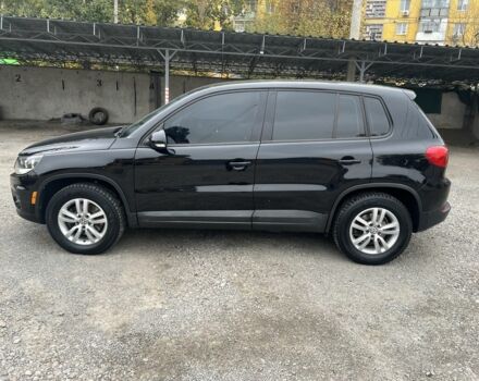 Черный Фольксваген Тигуан, объемом двигателя 2 л и пробегом 215 тыс. км за 10300 $, фото 2 на Automoto.ua