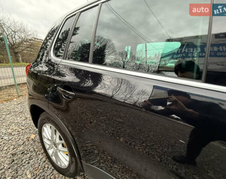Чорний Фольксваген Тігуан, об'ємом двигуна 2 л та пробігом 238 тис. км за 10599 $, фото 55 на Automoto.ua