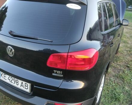 Чорний Фольксваген Тігуан, об'ємом двигуна 2 л та пробігом 370 тис. км за 8600 $, фото 2 на Automoto.ua