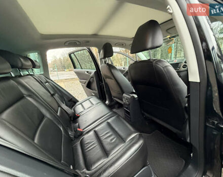 Чорний Фольксваген Тігуан, об'ємом двигуна 2 л та пробігом 238 тис. км за 10599 $, фото 33 на Automoto.ua