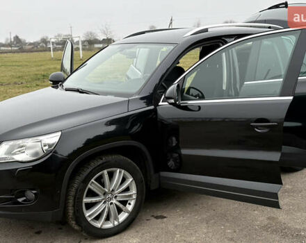 Черный Фольксваген Тигуан, объемом двигателя 1.39 л и пробегом 213 тыс. км за 9399 $, фото 24 на Automoto.ua