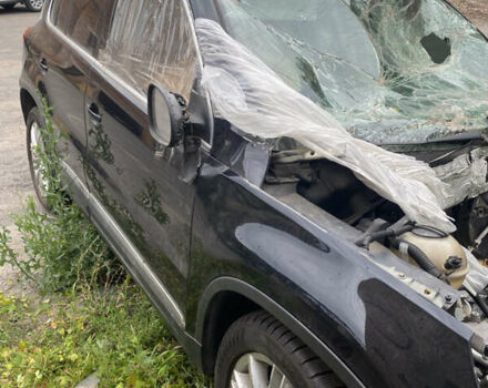 Чорний Фольксваген Тігуан, об'ємом двигуна 2 л та пробігом 270 тис. км за 2999 $, фото 5 на Automoto.ua