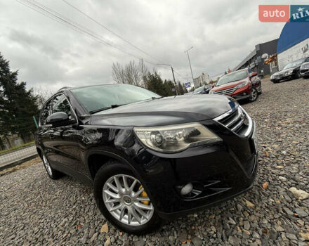 Чорний Фольксваген Тігуан, об'ємом двигуна 2 л та пробігом 238 тис. км за 10599 $, фото 1 на Automoto.ua