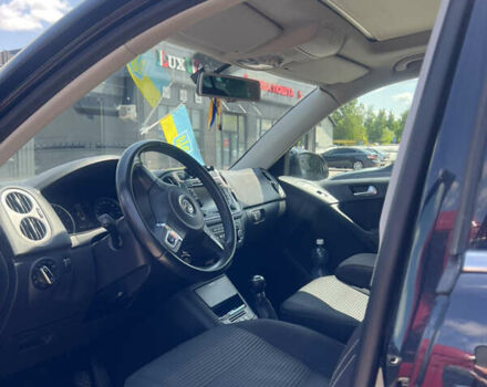 Чорний Фольксваген Тігуан, об'ємом двигуна 1.97 л та пробігом 386 тис. км за 10500 $, фото 4 на Automoto.ua