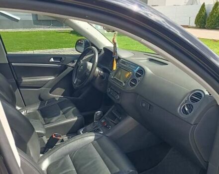 Черный Фольксваген Тигуан, объемом двигателя 2 л и пробегом 259 тыс. км за 11900 $, фото 12 на Automoto.ua