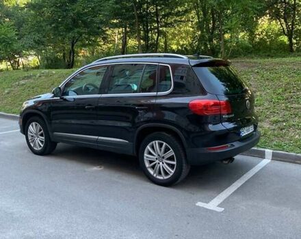 Чорний Фольксваген Тігуан, об'ємом двигуна 2 л та пробігом 226 тис. км за 11600 $, фото 1 на Automoto.ua