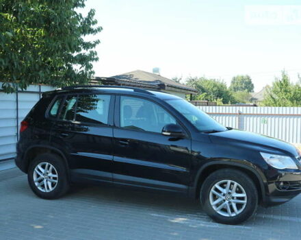 Черный Фольксваген Тигуан, объемом двигателя 2 л и пробегом 238 тыс. км за 10000 $, фото 2 на Automoto.ua