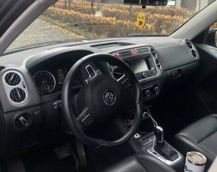 Чорний Фольксваген Тігуан, об'ємом двигуна 1.98 л та пробігом 239 тис. км за 11400 $, фото 1 на Automoto.ua