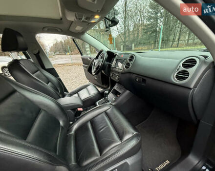 Чорний Фольксваген Тігуан, об'ємом двигуна 2 л та пробігом 238 тис. км за 10599 $, фото 27 на Automoto.ua