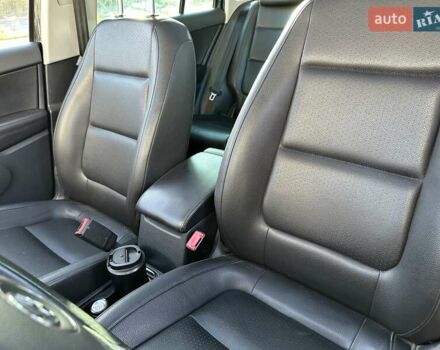 Черный Фольксваген Тигуан, объемом двигателя 2 л и пробегом 237 тыс. км за 10100 $, фото 9 на Automoto.ua