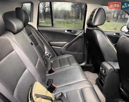 Черный Фольксваген Тигуан, объемом двигателя 1.98 л и пробегом 219 тыс. км за 11700 $, фото 14 на Automoto.ua