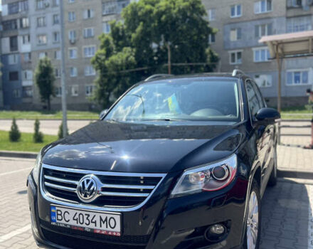Чорний Фольксваген Тігуан, об'ємом двигуна 1.97 л та пробігом 386 тис. км за 10500 $, фото 1 на Automoto.ua