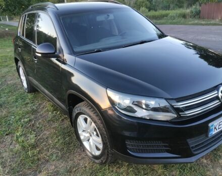 Чорний Фольксваген Тігуан, об'ємом двигуна 2 л та пробігом 370 тис. км за 8600 $, фото 1 на Automoto.ua