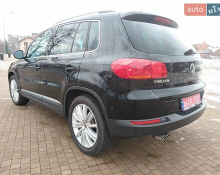 Чорний Фольксваген Тігуан, об'ємом двигуна 2 л та пробігом 227 тис. км за 8999 $, фото 4 на Automoto.ua