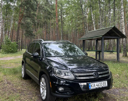 Чорний Фольксваген Тігуан, об'ємом двигуна 2 л та пробігом 330 тис. км за 9600 $, фото 6 на Automoto.ua