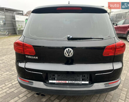 Чорний Фольксваген Тігуан, об'ємом двигуна 2 л та пробігом 165 тис. км за 9499 $, фото 3 на Automoto.ua