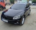 Чорний Фольксваген Тігуан, об'ємом двигуна 2 л та пробігом 189 тис. км за 11100 $, фото 1 на Automoto.ua