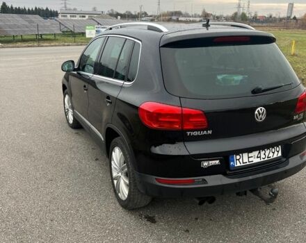 Чорний Фольксваген Тігуан, об'ємом двигуна 2 л та пробігом 160 тис. км за 7800 $, фото 2 на Automoto.ua