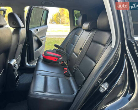 Чорний Фольксваген Тігуан, об'ємом двигуна 2 л та пробігом 189 тис. км за 10300 $, фото 27 на Automoto.ua