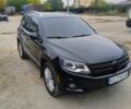 Чорний Фольксваген Тігуан, об'ємом двигуна 2 л та пробігом 189 тис. км за 11100 $, фото 5 на Automoto.ua