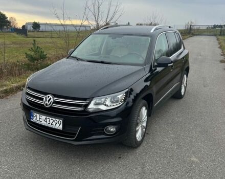 Чорний Фольксваген Тігуан, об'ємом двигуна 2 л та пробігом 160 тис. км за 7800 $, фото 1 на Automoto.ua