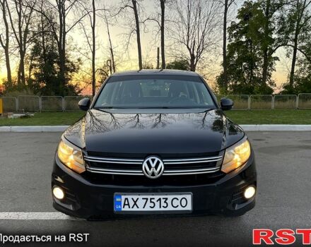 Черный Фольксваген Тигуан, объемом двигателя 2 л и пробегом 181 тыс. км за 9200 $, фото 1 на Automoto.ua