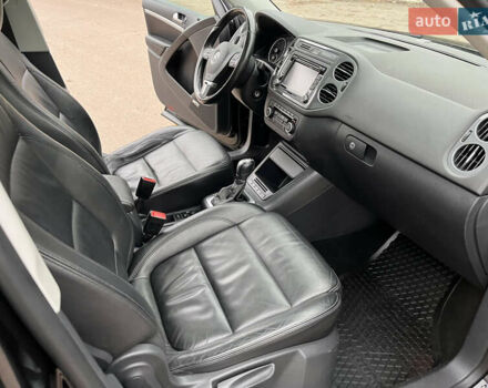 Черный Фольксваген Тигуан, объемом двигателя 1.99 л и пробегом 320 тыс. км за 14499 $, фото 147 на Automoto.ua