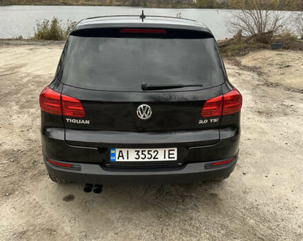 Черный Фольксваген Тигуан, объемом двигателя 1.98 л и пробегом 210 тыс. км за 10500 $, фото 3 на Automoto.ua