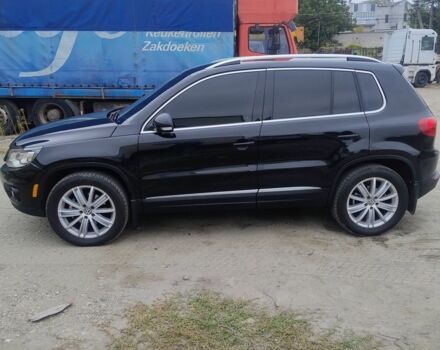 Чорний Фольксваген Тігуан, об'ємом двигуна 2 л та пробігом 189 тис. км за 11100 $, фото 1 на Automoto.ua